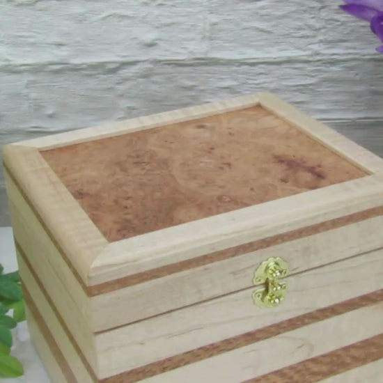 Video showing details of unique small keepsake box handmade from curly maple and lacewood by A Finer Cut Woodworking. 