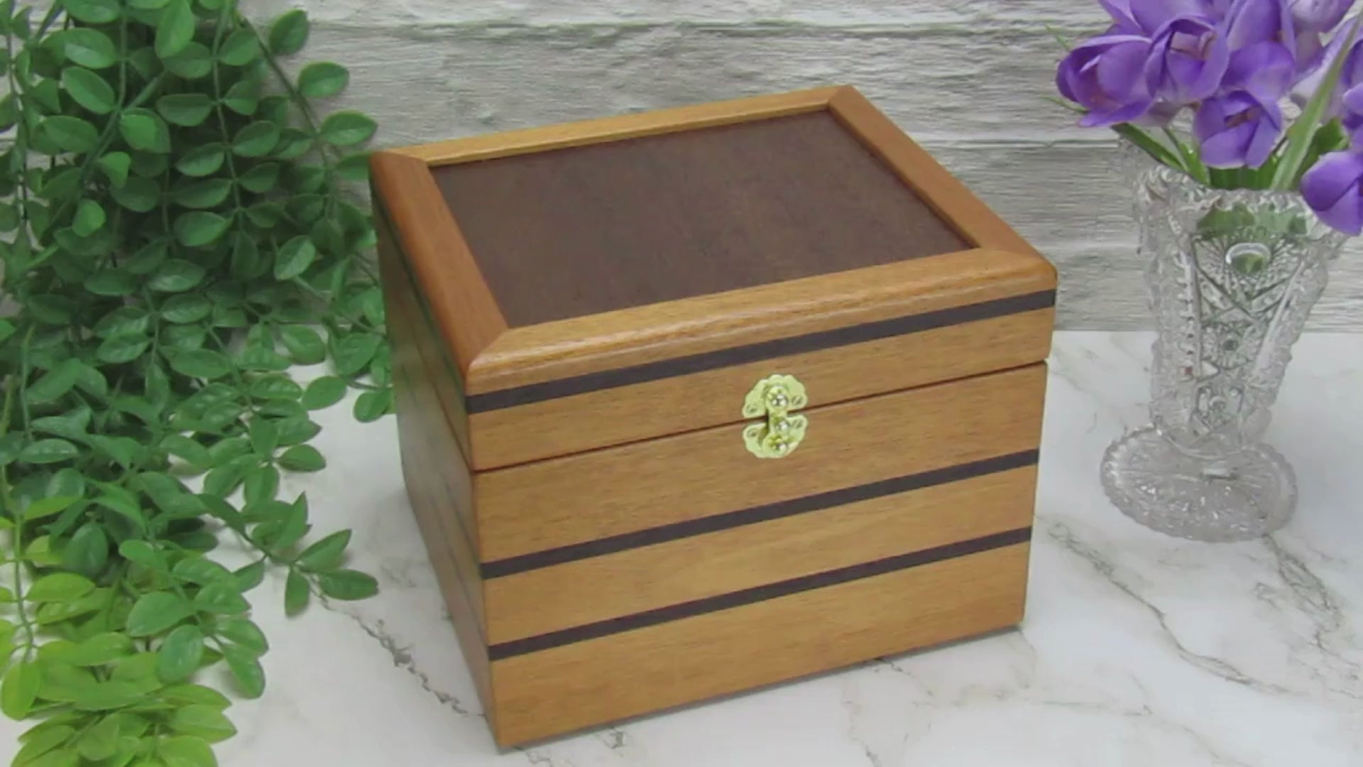 Video showing details of small wooden memory box handmade from mahogany, wenge and Peruvian walnut by A Finer Cut.
