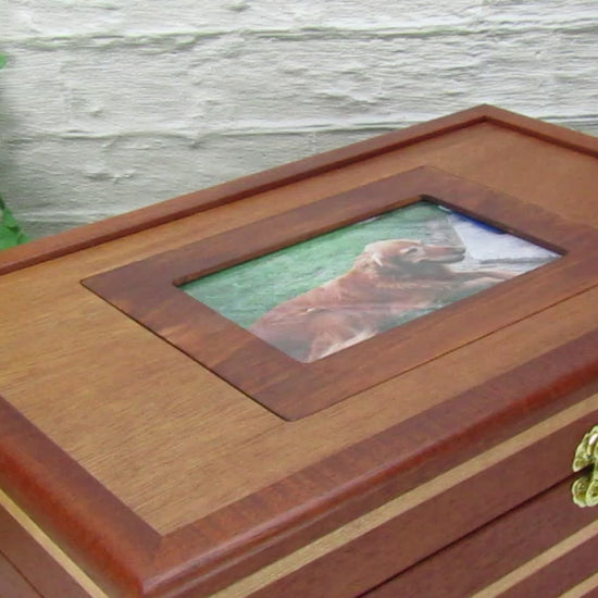 Video showing details of pet memory box with photo lid handmade from Honduran mahogany and cherry by A Finer Cut Woodworking