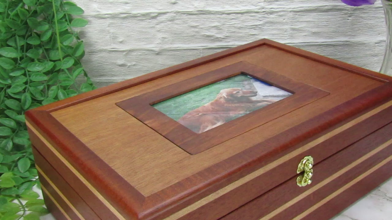 Video showing details of pet memory box with photo lid handmade from Honduran mahogany and cherry by A Finer Cut Woodworking
