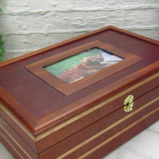 Video showing details of pet memorial box handmade from mahogany, cherry, and dark finished mahogany veneer by A Finer Cut Woodworking.
