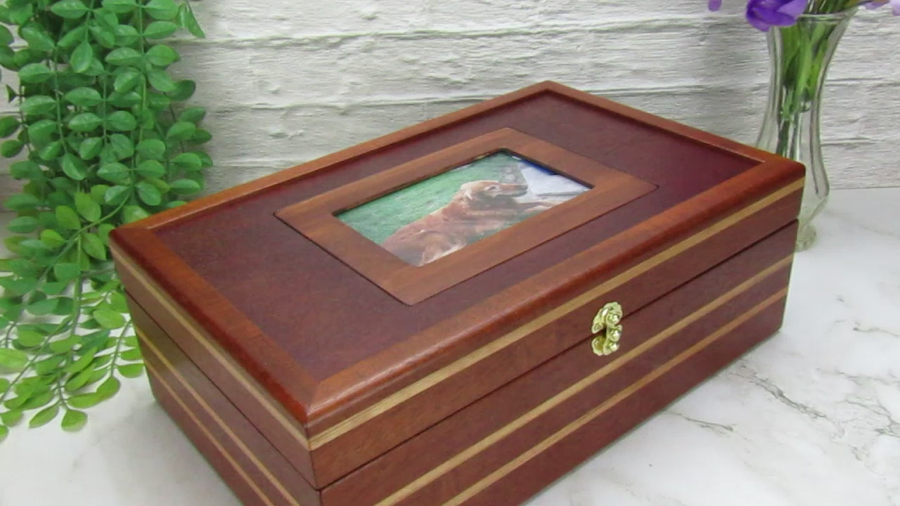 Video showing details of pet memorial box handmade from mahogany, cherry, and dark finished mahogany veneer by A Finer Cut Woodworking.
