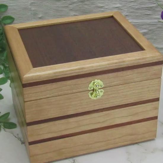 Video showing details of unique small keepsake box handmade from cherry, mahogany and Peruvian walnut wood by A Finer Cut.