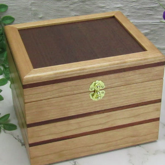 Video showing details of unique small keepsake box handmade from cherry, mahogany and Peruvian walnut wood by A Finer Cut.