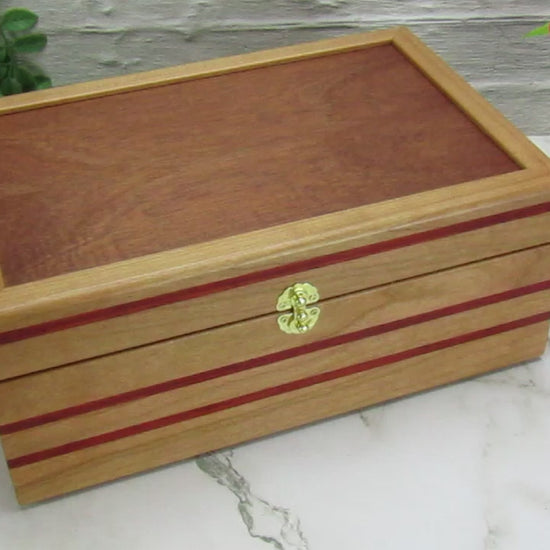 Video showing details of handmade memory box crafted from cherry and mahogany wood with padauk inlays by A Finer Cut Wood.