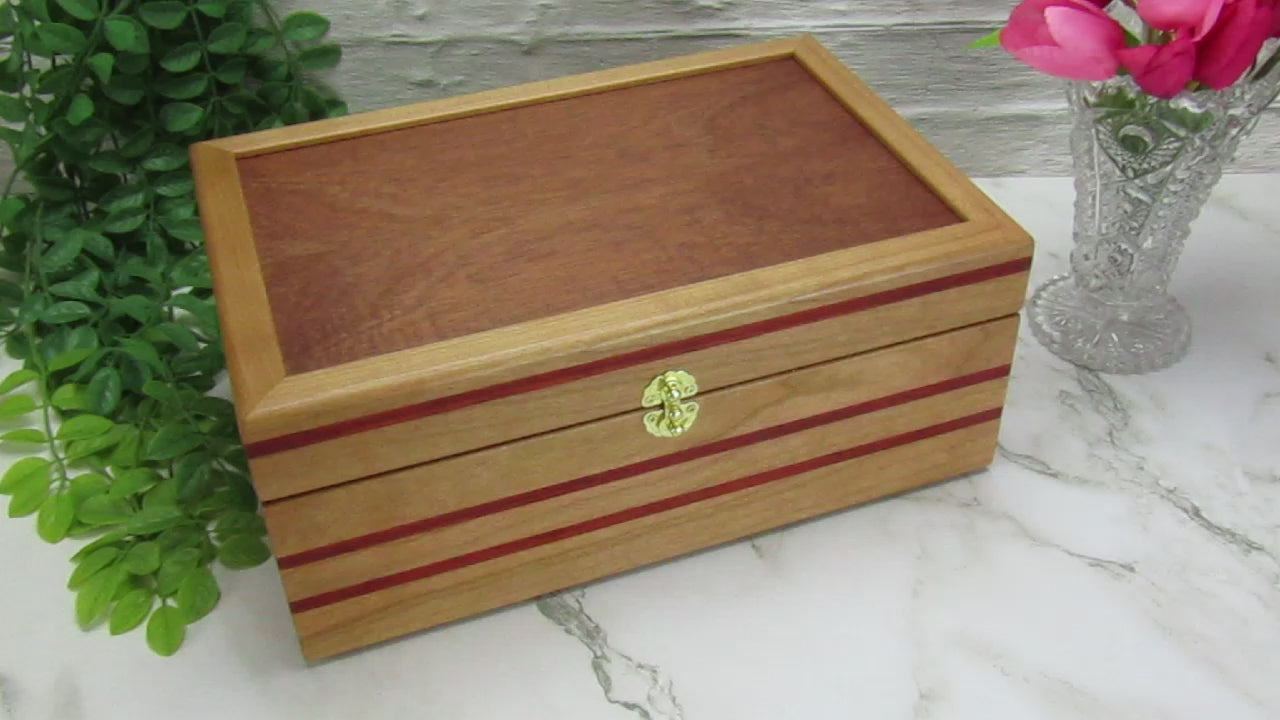 Video showing details of handmade memory box crafted from cherry and mahogany wood with padauk inlays by A Finer Cut Wood.