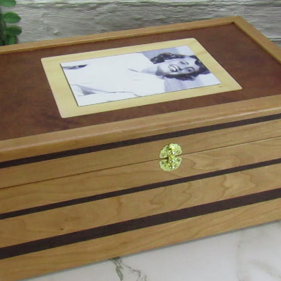 Video showing details of memorial box handcrafted from cherry, mahogany and wenge wood by A Finer Cut Woodworking. 