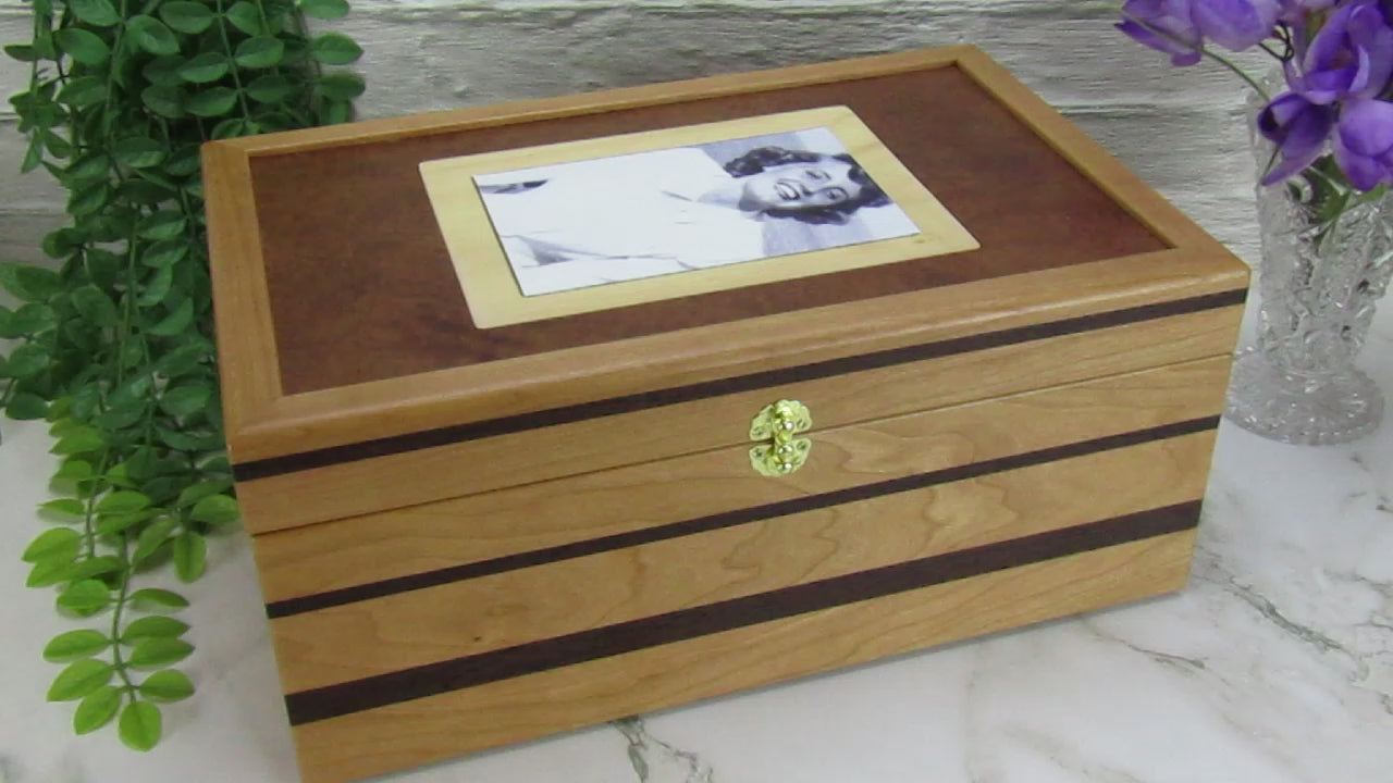 Video showing details of memorial box handcrafted from cherry, mahogany and wenge wood by A Finer Cut Woodworking. 