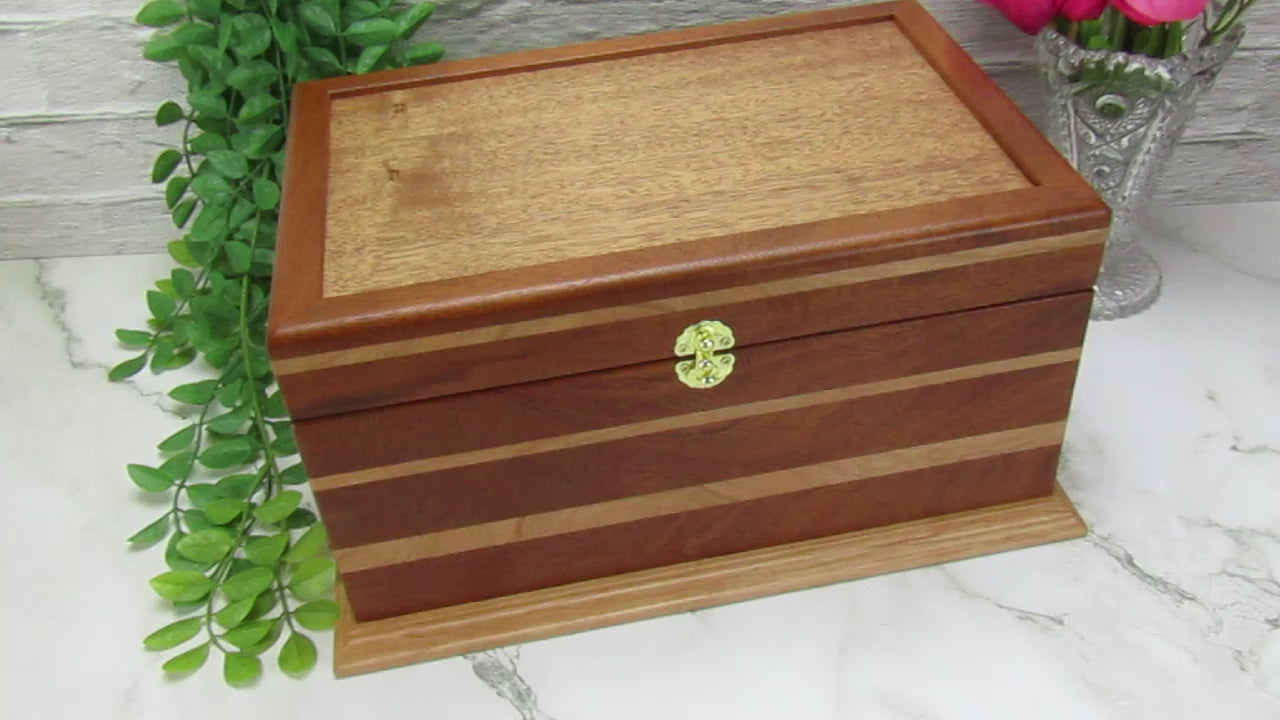 Video showing details of large keepsake box handmade from Honduran mahogany and cherry wood by A Finer Cut Woodworking.