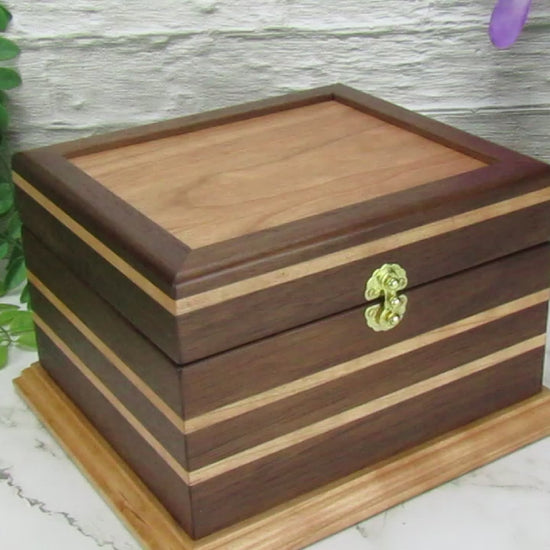Video showing details of keepsake memory box handmade from Peruvian walnut and cherry by A Finer Cut Woodwork.