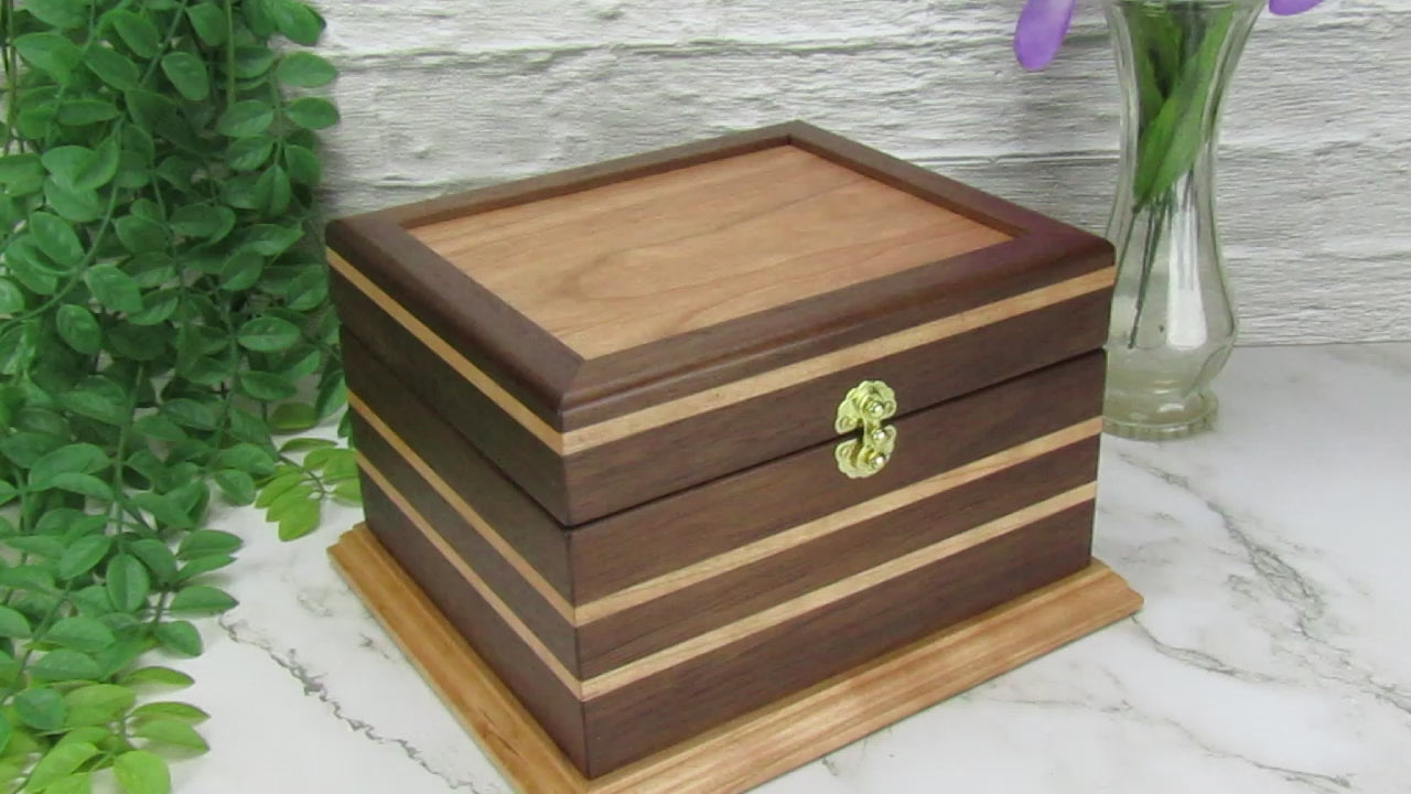 Video showing details of keepsake memory box handmade from Peruvian walnut and cherry by A Finer Cut Woodwork.