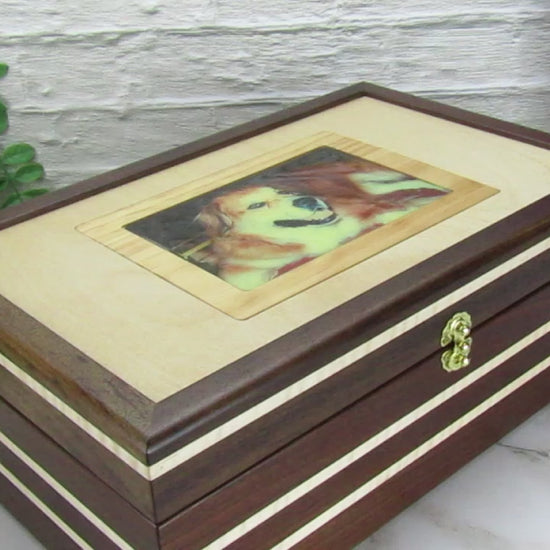 Video showing details of pet memory box with photo lid handmade from Peruvian walnut and curly maple by A Finer Cut Wood.