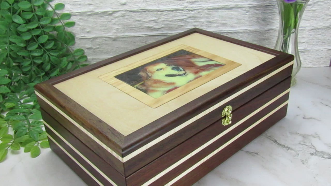 Video showing details of pet memory box with photo lid handmade from Peruvian walnut and curly maple by A Finer Cut Wood.