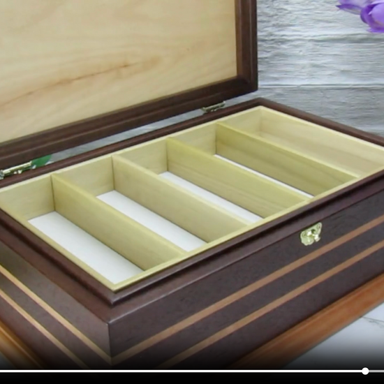 Video showing details of handmade keepsake box crafted from Peruvian walnut, cherry, cherry veneer, and a pear base by A Finer Cut Woodworking.
