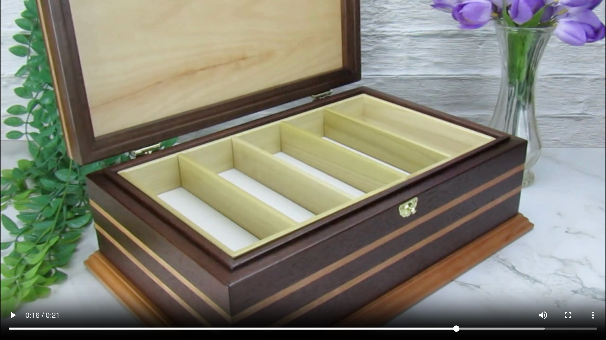 Video showing details of handmade keepsake box crafted from Peruvian walnut, cherry, cherry veneer, and a pear base by A Finer Cut Woodworking.