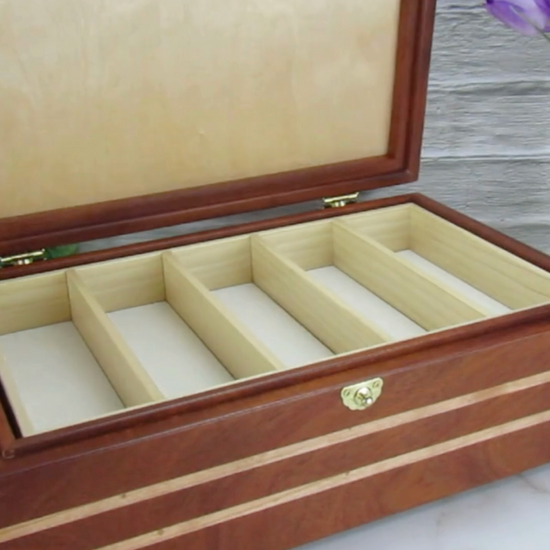 Video showing details of handmade keepsake box crafted from mahogany, cherry, and cherry veneer by A Finer Cut Woodworking.