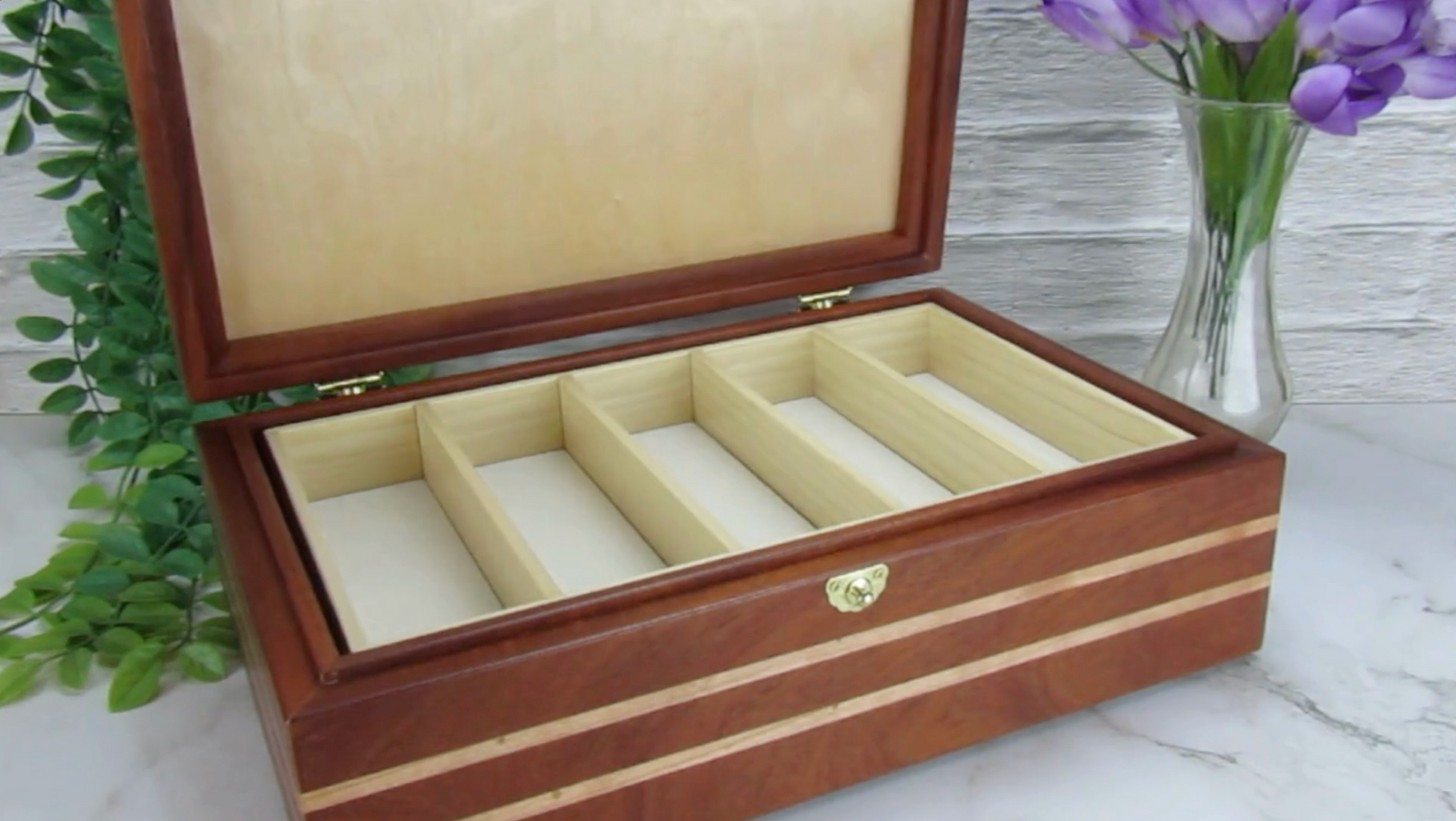 Video showing details of handmade keepsake box crafted from mahogany, cherry, and cherry veneer by A Finer Cut Woodworking.