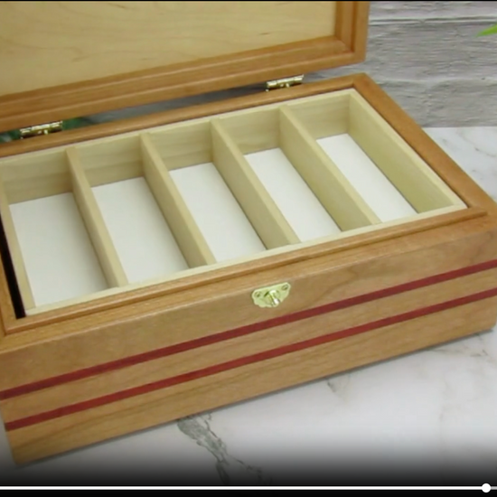 Video showing details of handmade memory box crafted from cherry and mahogany wood with padauk inlays by A Finer Cut Wood.
