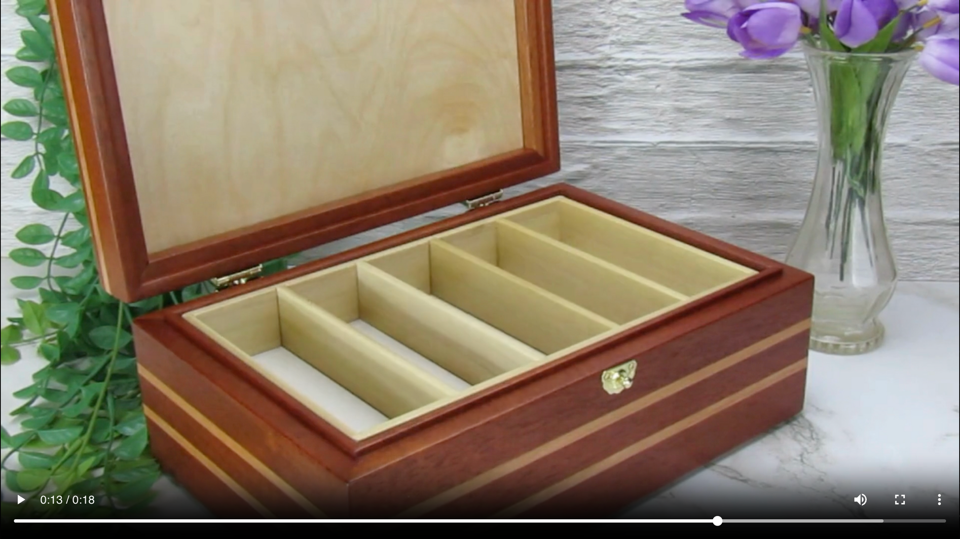 Video showing details of handmade wood jewelry box crafted from mahogany, cherry, and mahogany veneer by A Finer Cut Woodwork.