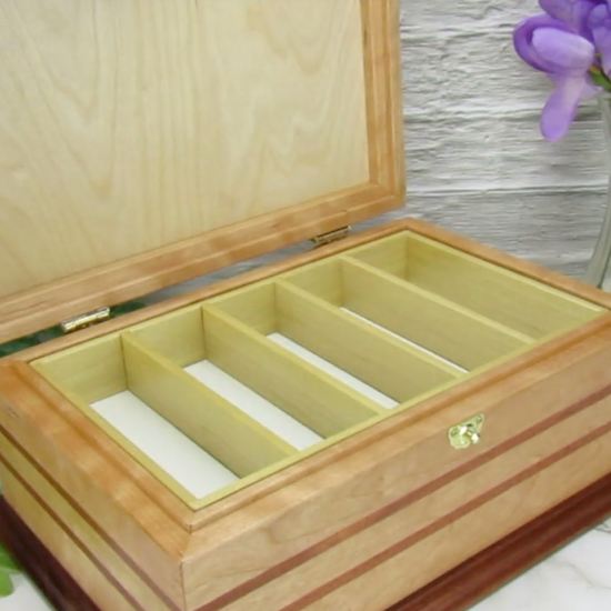 Video showing details of handmade wood jewelry box crafted from cherry with Brazilian cherry inlays by A Finer Cut Woodwork.