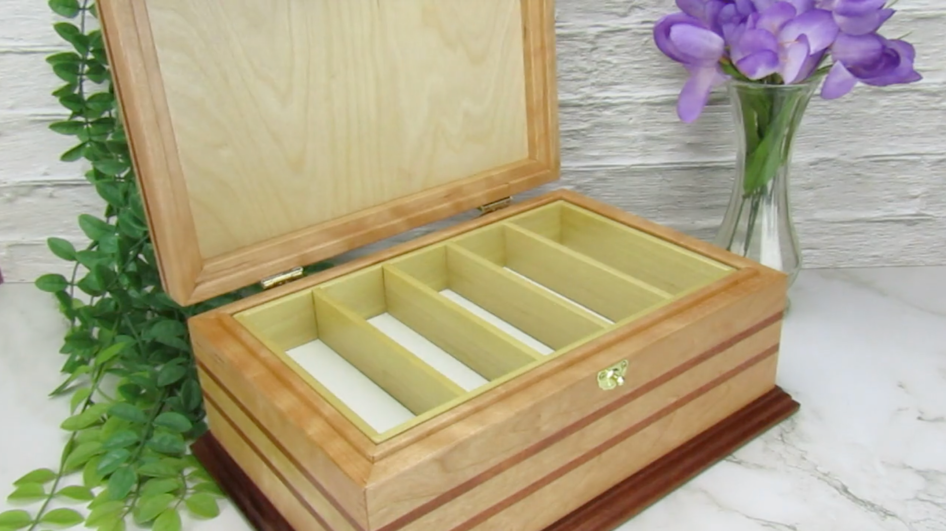 Video showing details of handmade wood jewelry box crafted from cherry with Brazilian cherry inlays by A Finer Cut Woodwork.