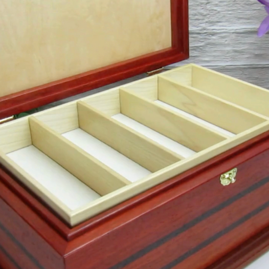 Video showing details of handmade wooden box crafted from padauk, wenge, Brazilian cherry, and walnut burl veneer by A Finer Cut Woodworking.