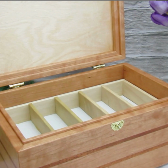 Video showing details of large keepsake box handmade from cherry, mahogany, and cherry veneer by A Finer Cut Woodworking.