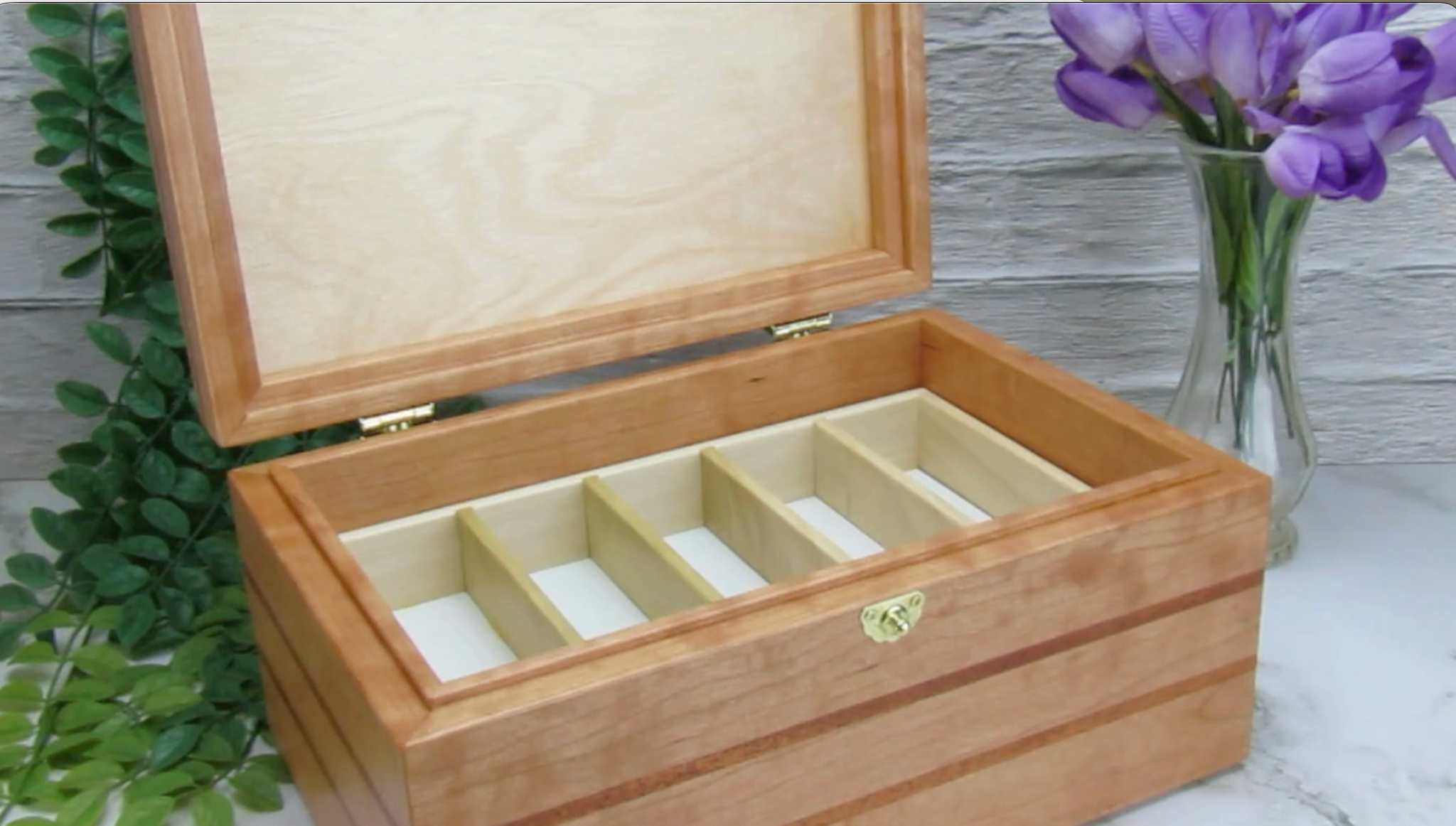 Video showing details of large keepsake box handmade from cherry, mahogany, and cherry veneer by A Finer Cut Woodworking.