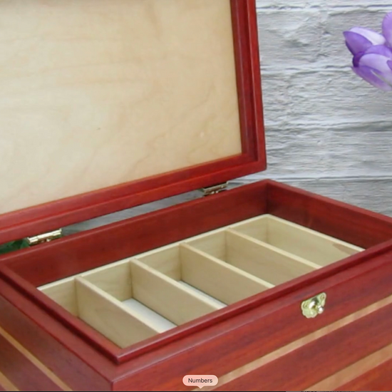 Video showing details of large memory box handmade from padauk and cherry wood by A Finer Cut Woodworking.