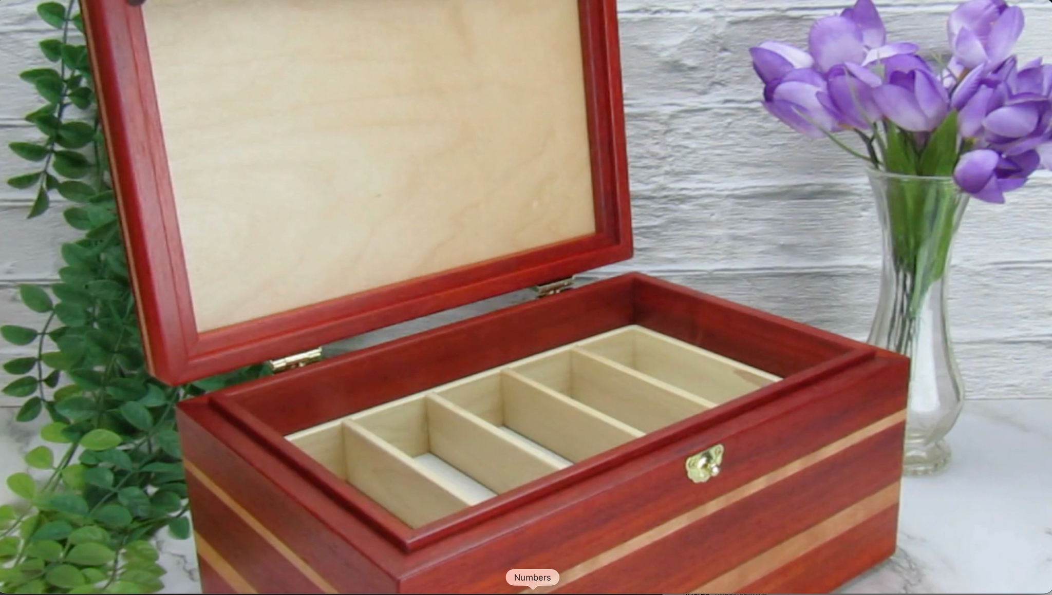 Video showing details of large memory box handmade from padauk and cherry wood by A Finer Cut Woodworking.