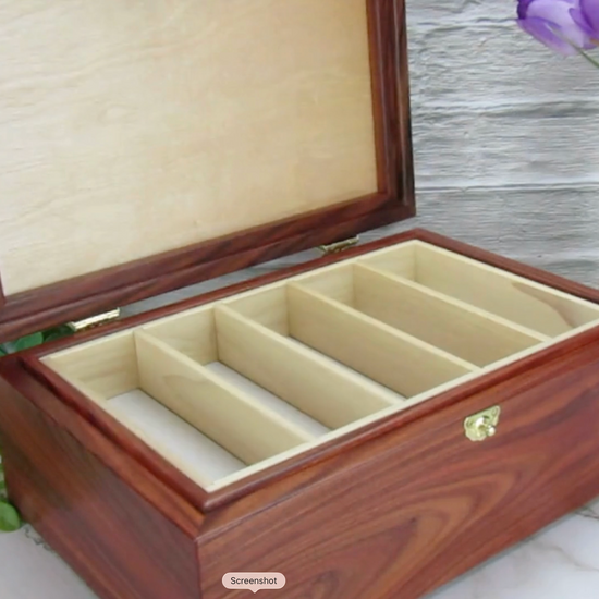 Video showing details of unique memorial box handcrafted from Bolivian rosewood, wenge, and walnut burl veneer by A Finer Cut Woodworking. 