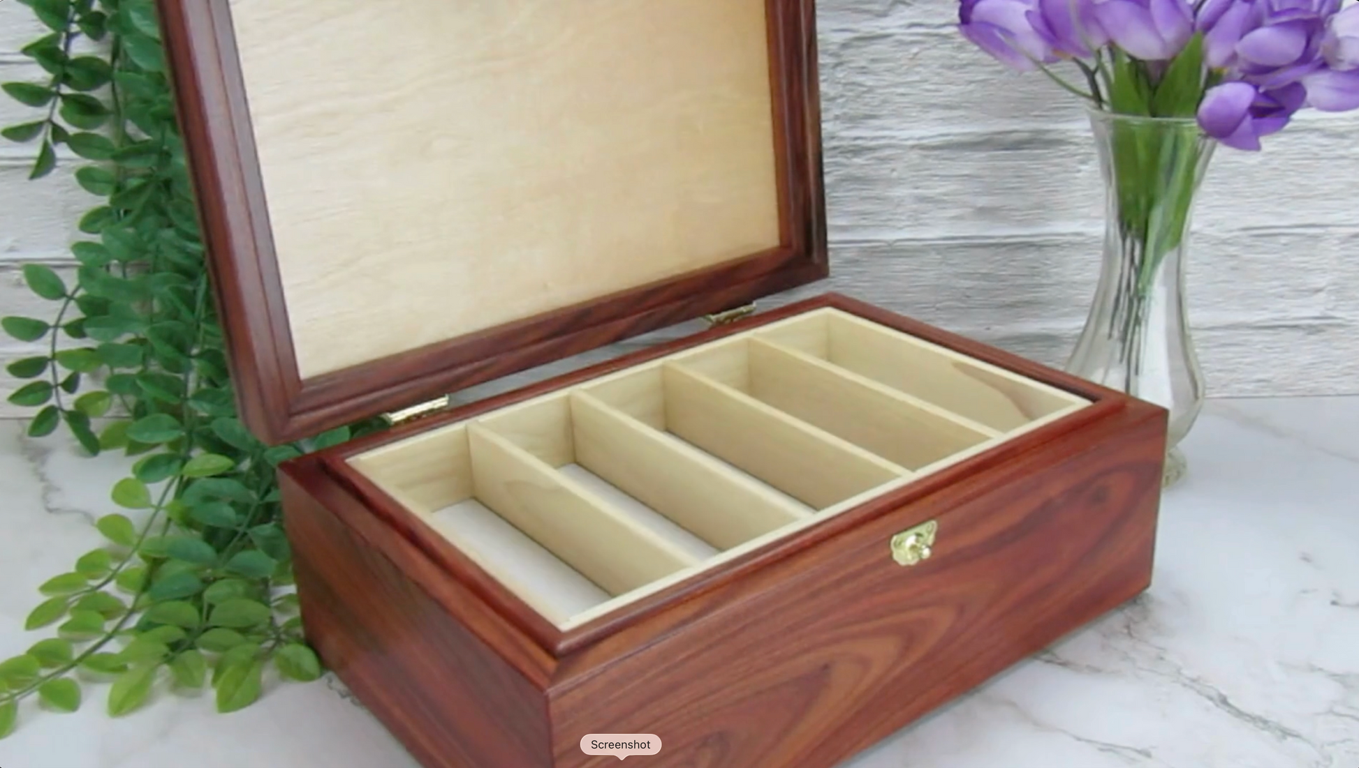 Video showing details of unique memorial box handcrafted from Bolivian rosewood, wenge, and walnut burl veneer by A Finer Cut Woodworking. 
