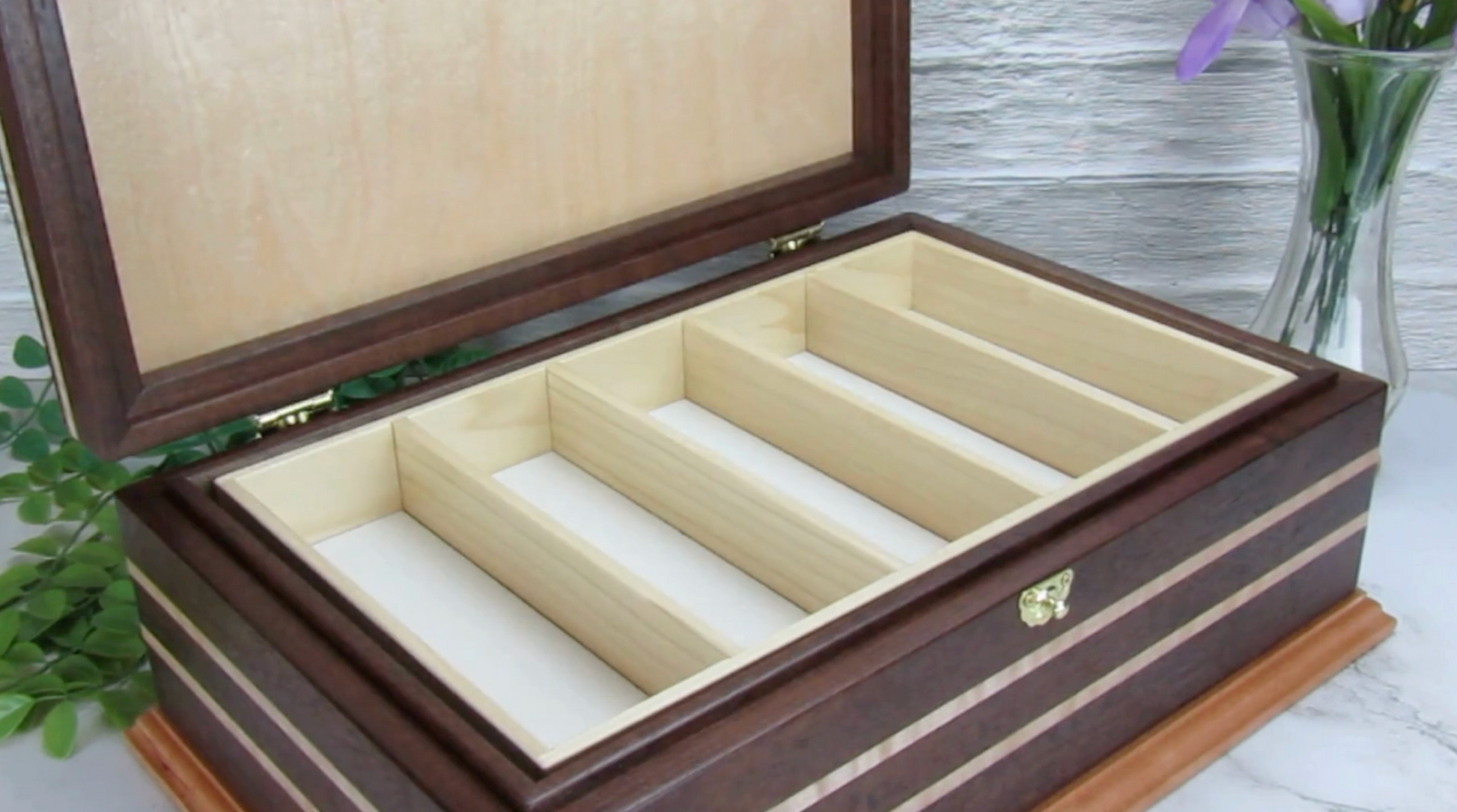 Video showing details of unique memorial keepsake box handmade from Peruvian walnut, curly maple, cherry, and bird's eye maple veneer  by A Finer Cut Woodworking.