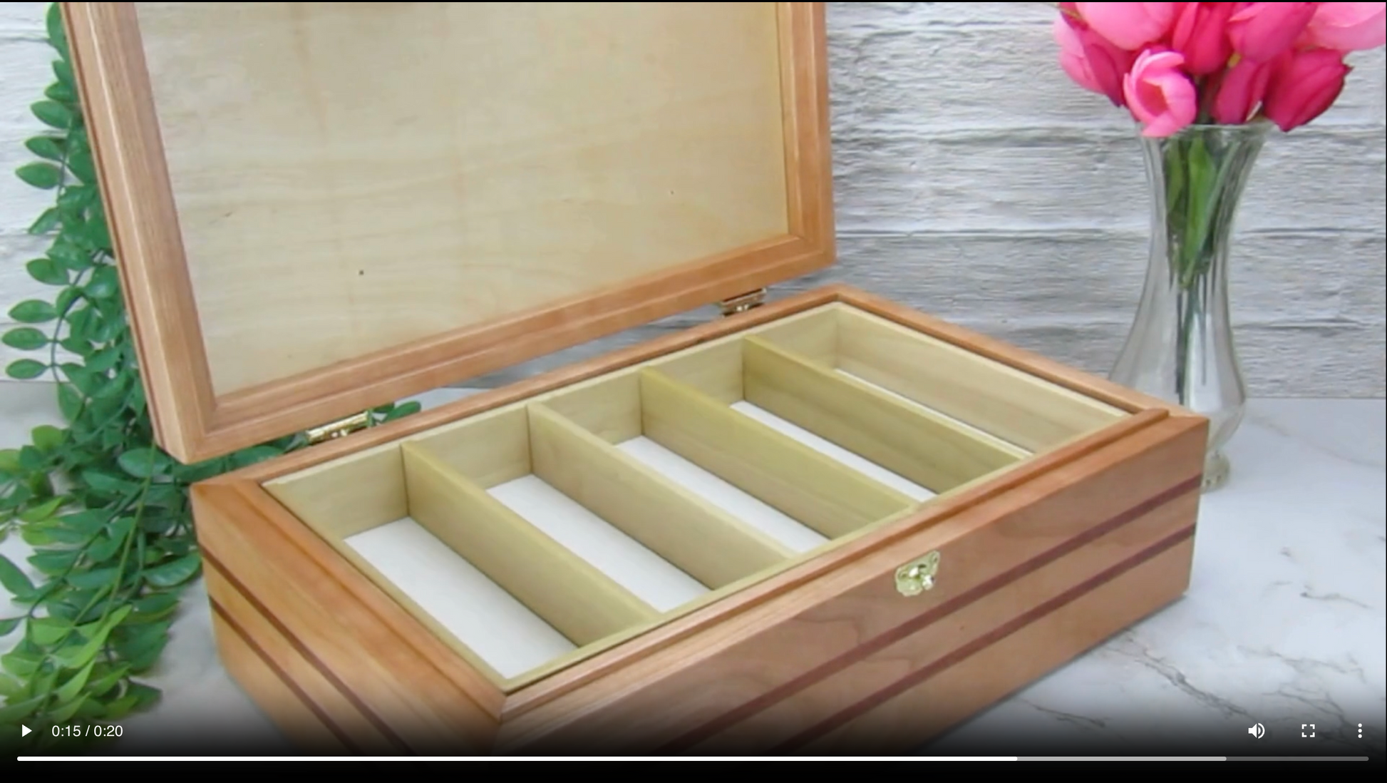 Video showing details of pet memorial box with photo lid handmade from cherry, mahogany, and birds eye maple veneer by A Finer Cut Woodwork.