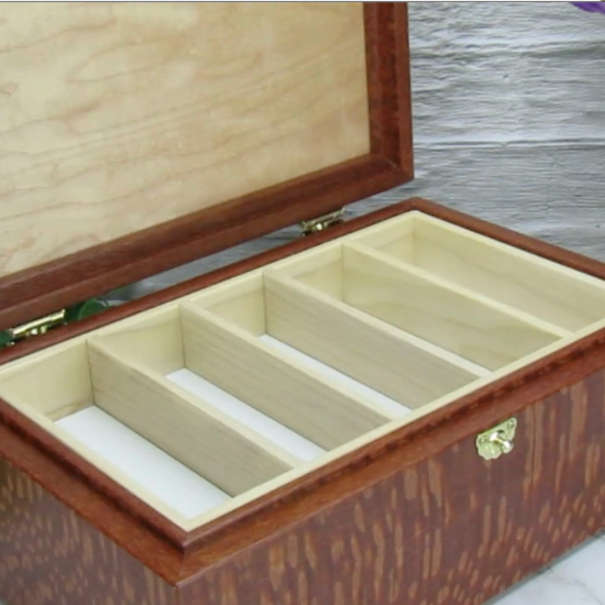 Video showing details of valet box for men handcrafted from leopardwood with mahogany inlay by A Finer Cut Woodworking.