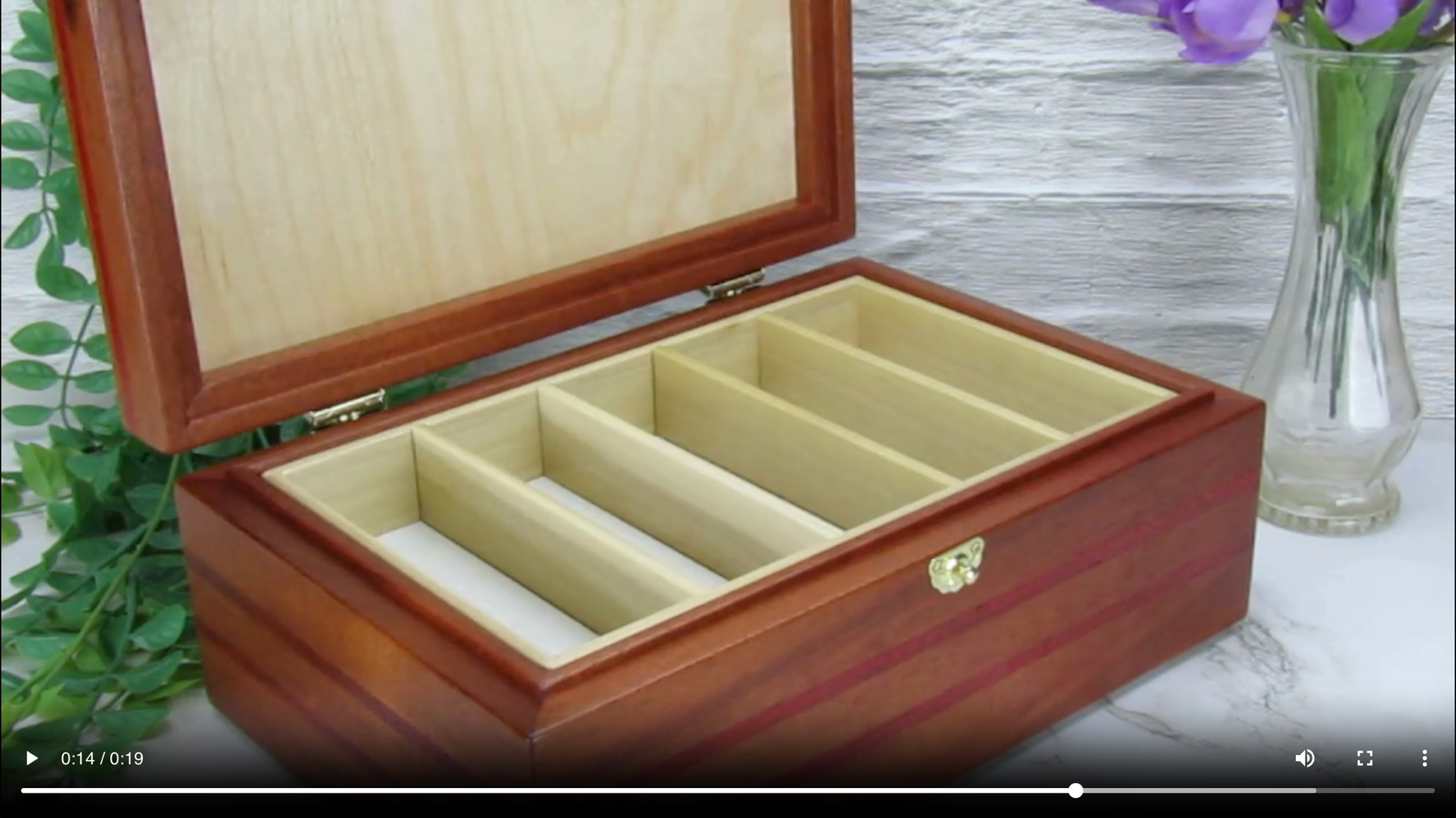 Video showing details of valet box for men handcrafted from mahogany with padauk wood inlays by A Finer Cut Woodworking.