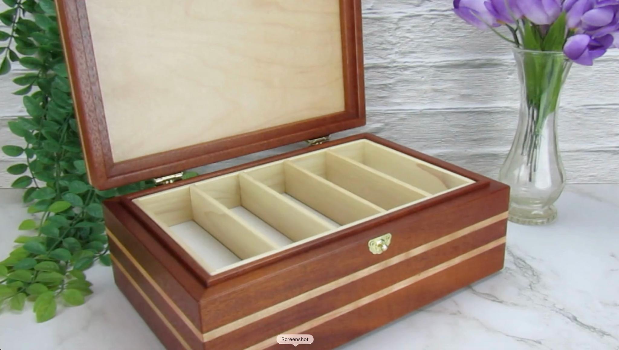 Video showing details of valet box for men handcrafted from mahogany, cherry, and cherry veneer by A Finer Cut Wood.