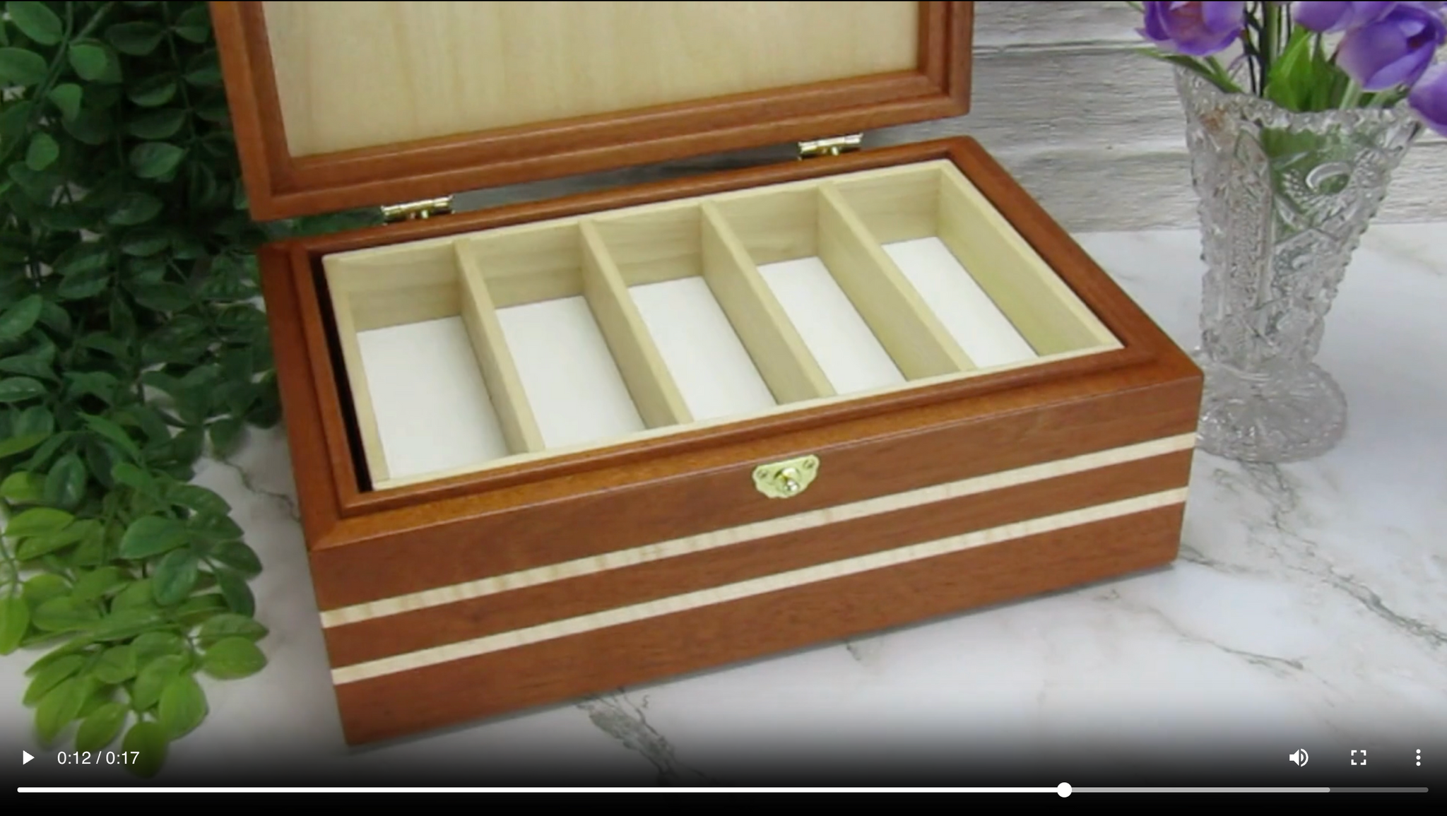 Video showing details of valet box for men handcrafted from mahogany, curly and maple wood by A Finer Cut Wood.