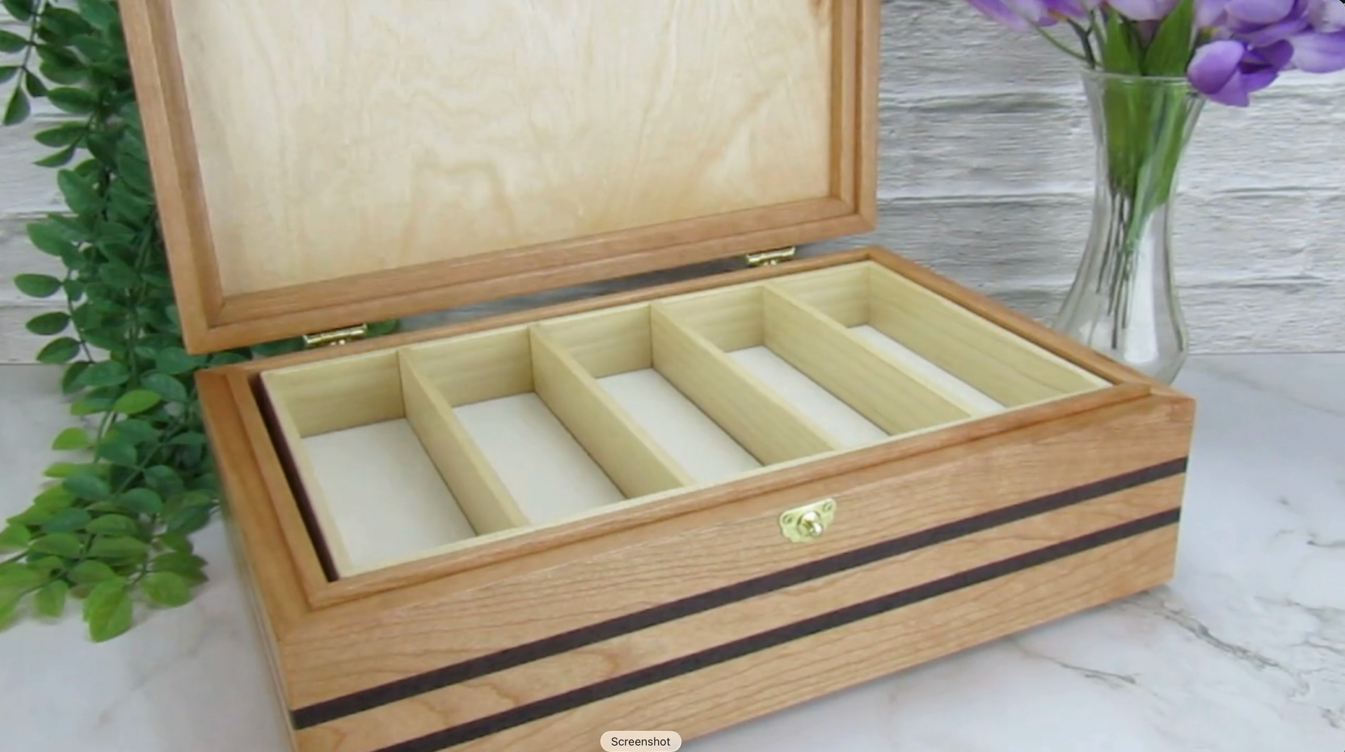 Video showing details of wooden keepsake box handmade from cherry, wenge, and dark finished cherry veneer by A Finer Cut Woodworking.