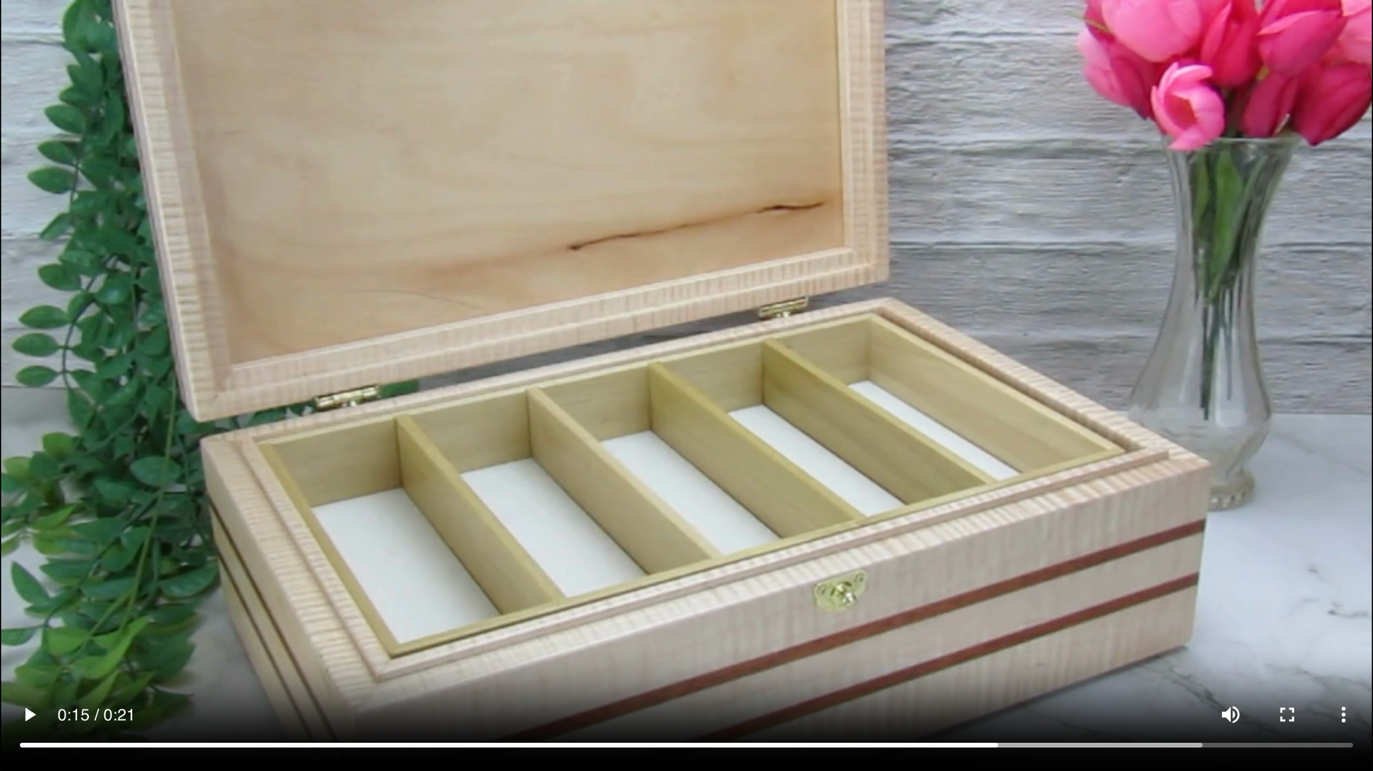 Video showing details of wooden keepsake box handmade from curly maple, mahogany, and cherry veneer by A Finer Cut Woodworking.