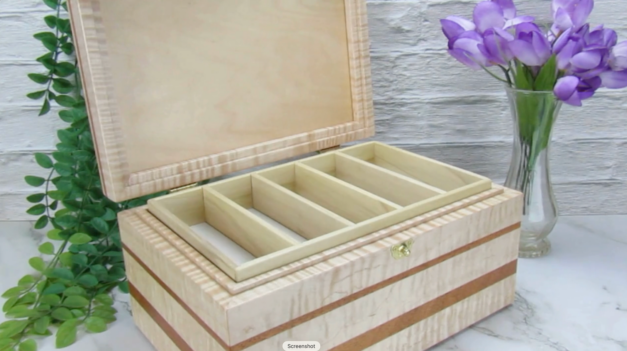 Video showing details of wooden memory box handmade from curly maple and mahogany by A Finer Cut Woodworking.
