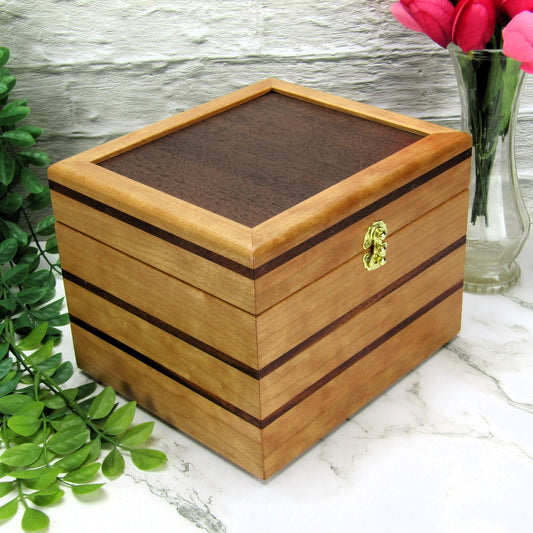 Thumbnail of unique small keepsake box handmade from cherry, mahogany and Peruvian walnut wood by A Finer Cut.