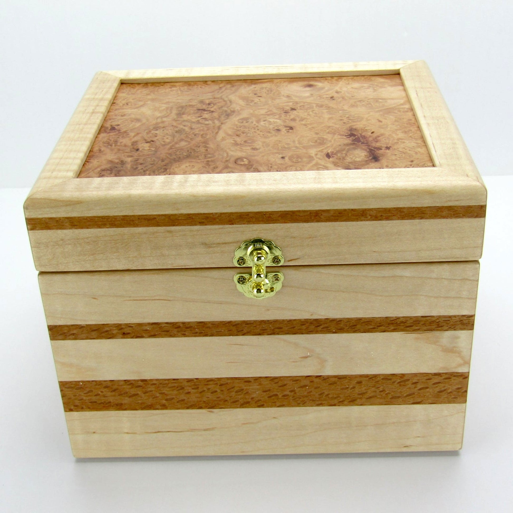 Front view of unique small keepsake box handmade from curly maple and lacewood by A Finer Cut Woodworking. 