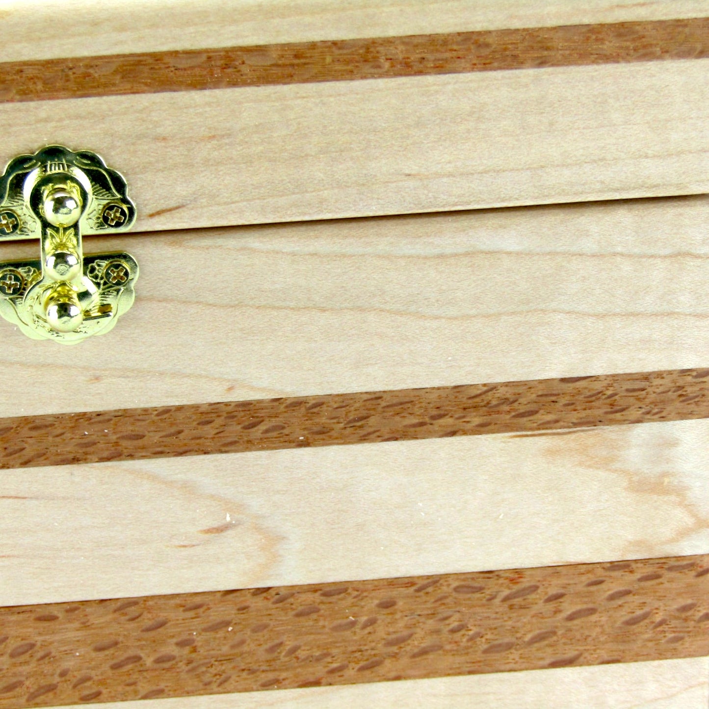Inlays on unique small keepsake box handmade from curly maple and lacewood by A Finer Cut Woodworking. 