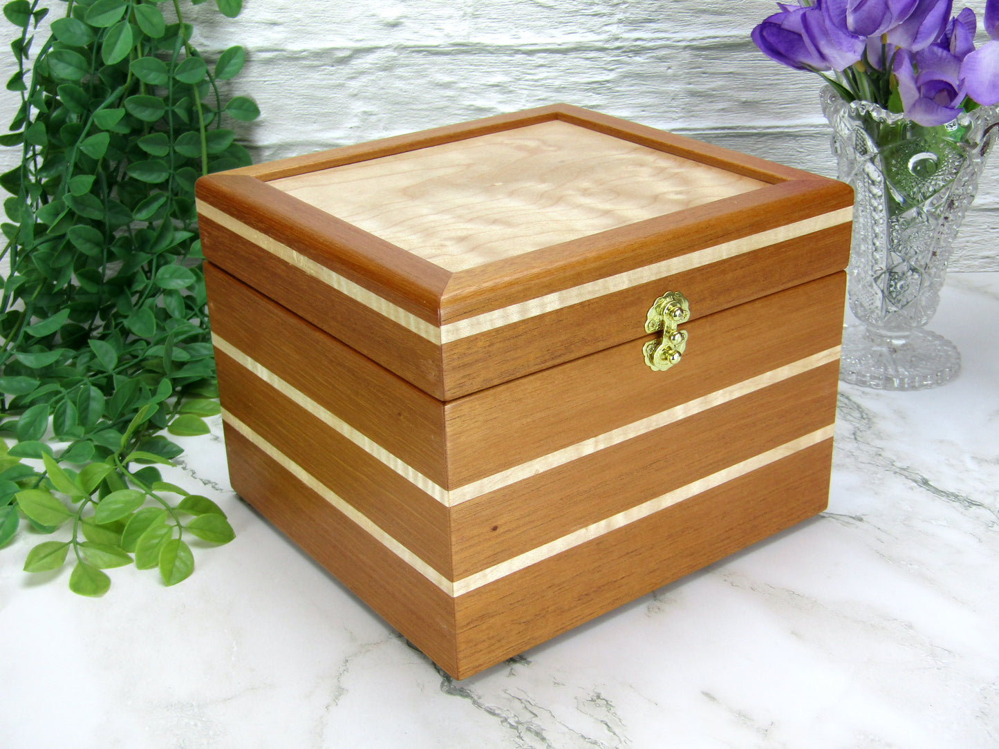 Thumbnail of unique small keepsake box handmade from mahogany and maple wood by A Finer Cut Woodworking. 