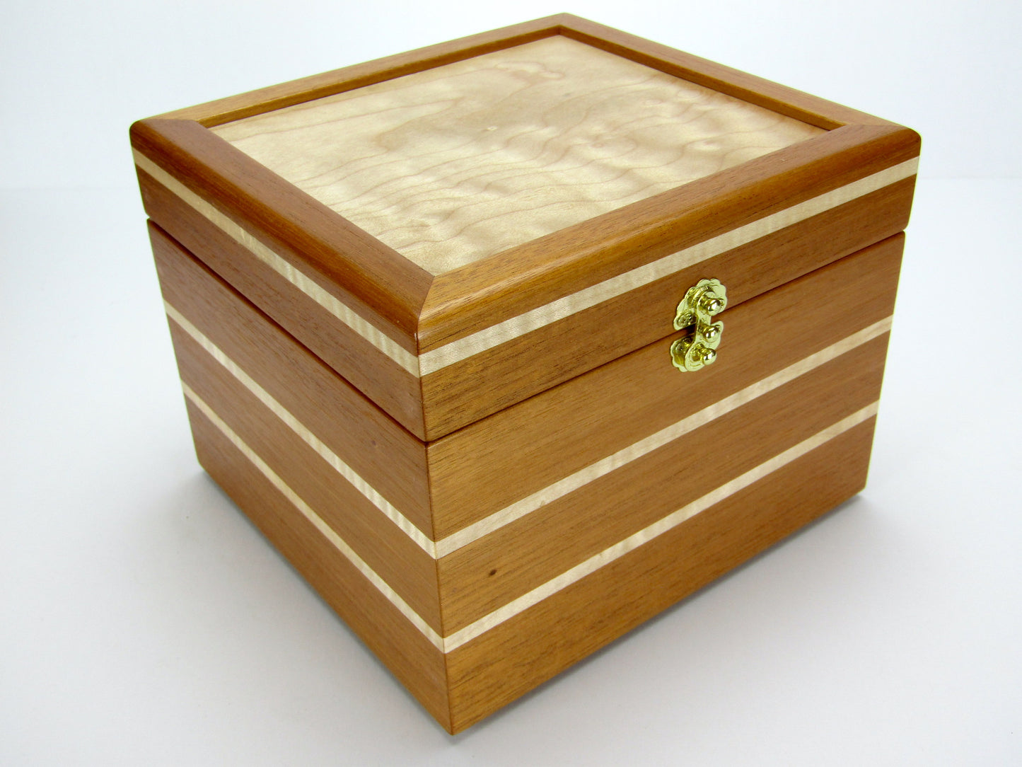 Front view of unique small keepsake box handmade from mahogany and maple wood by A Finer Cut Woodworking. 