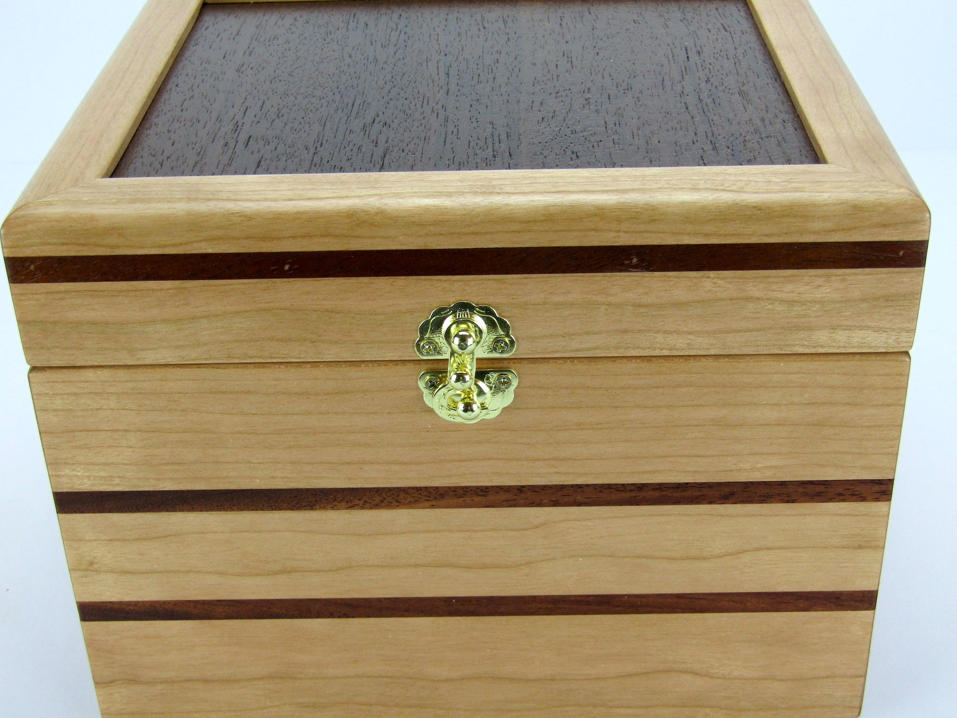 Inlays on unique small keepsake box handmade from cherry, mahogany and Peruvian walnut wood by A Finer Cut.