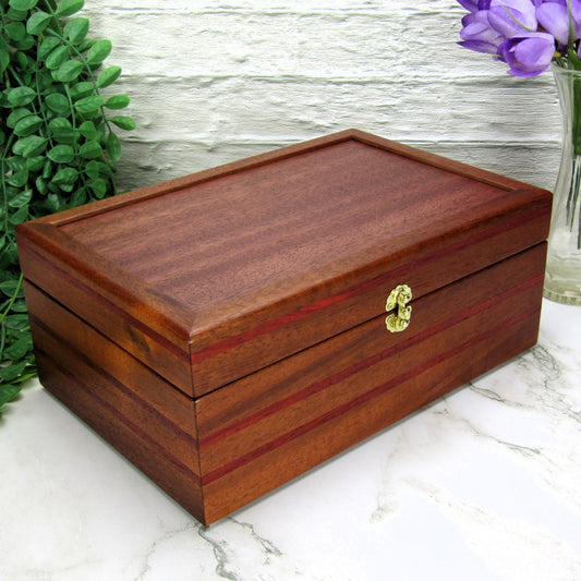 Thumbnail of valet box for men handcrafted from mahogany with padauk wood inlays by A Finer Cut Woodworking.