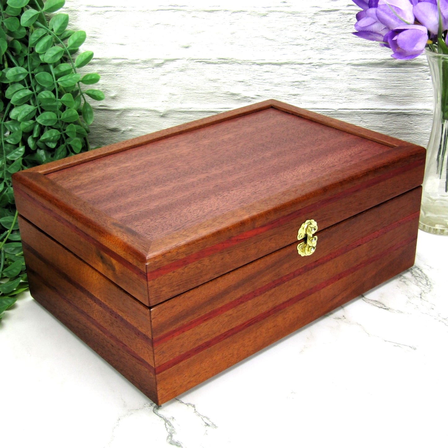 Thumbnail of valet box for men handcrafted from mahogany with padauk wood inlays by A Finer Cut Woodworking.