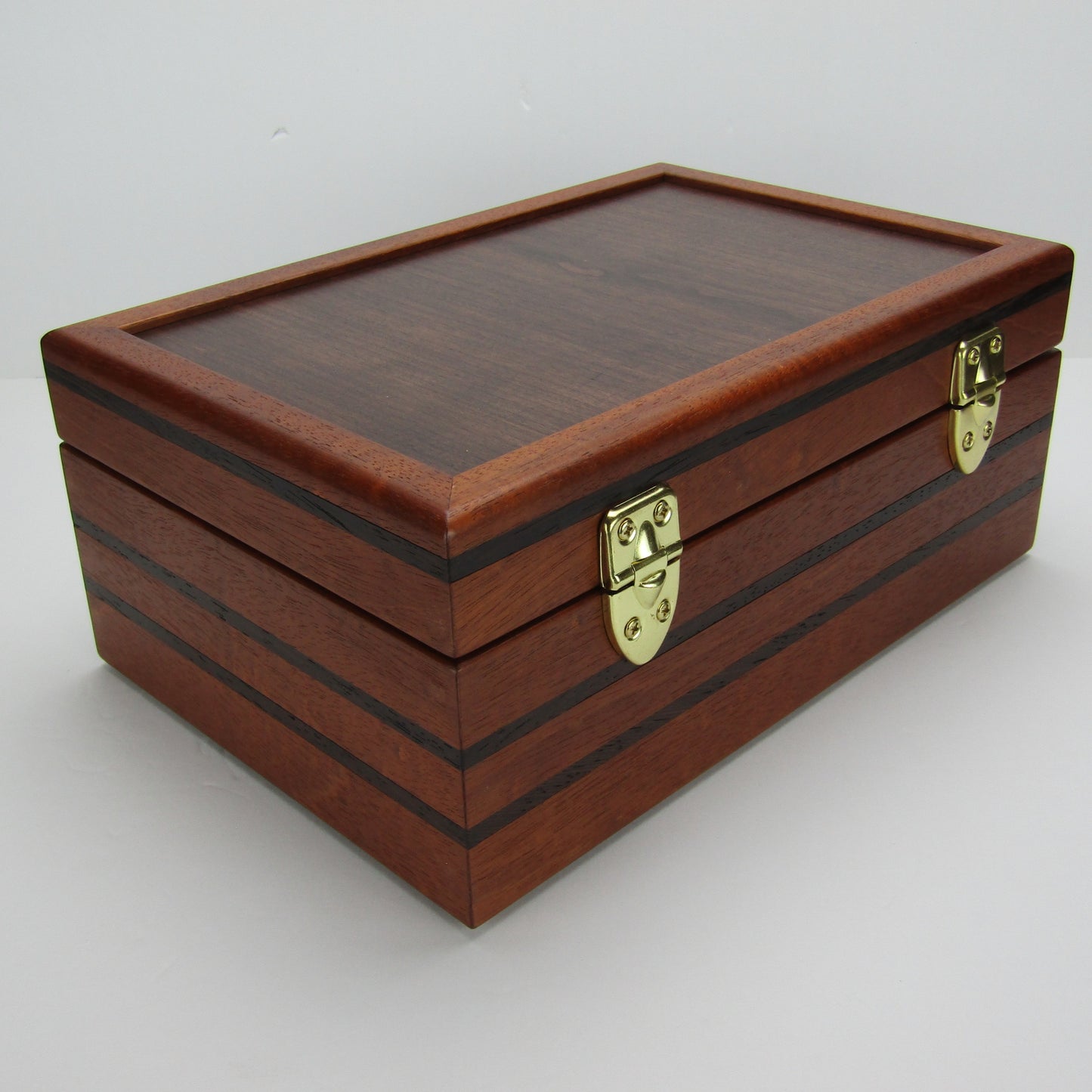 Back view of valet box for men handcrafted from mahogany, with wenge inlay and a dark finished cherry veneer lid  by A Finer Cut Woodworking.